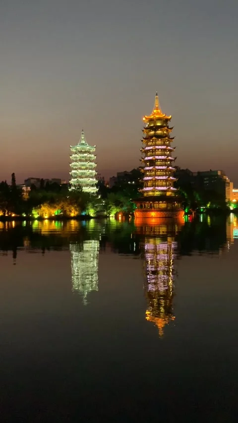 Sun and Moon Pagodas by night in Guilin Stock Footage 341276600