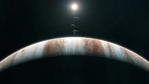 The Sun and the Moons Set Behind Jupiter - Above Stock Footage 132522091