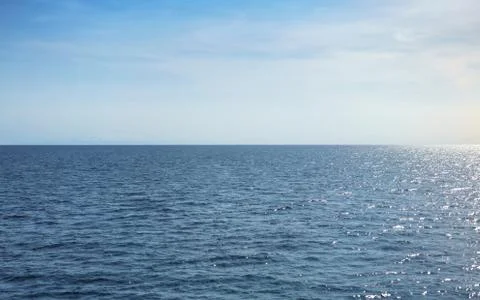 Sun and open ocean Stock Photos