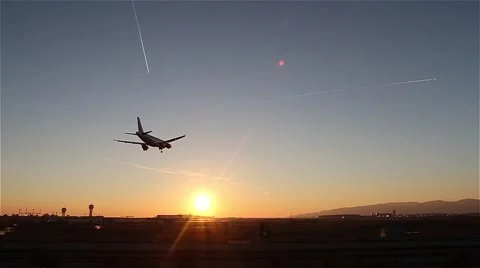 Sun and plane landing Video stock 45978001