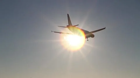 Sun and Plane passing by Video stock 45977342