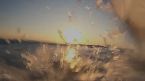 Sun and waves over Stock Footage 148514427