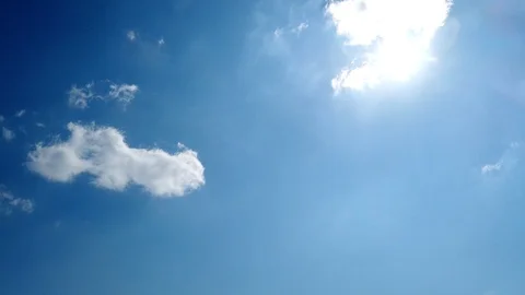 Sun and white clouds in the sky Stock Footage 127003534
