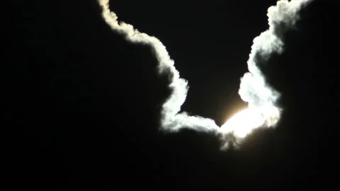 Sun appearing once behind clouds Stock Footage 155334174