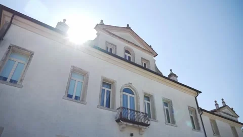 Sun appears above a large villa. Stock Footage 276606535