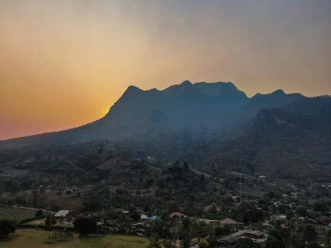 Sun Appears Behind Doi Chiang Dao - AERIAL Stock Photos