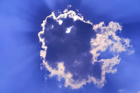 Sun babk on cloud and sunlight shine and passing on purple blue sky Stock-Fotos