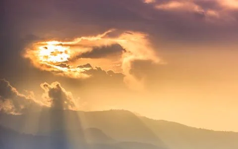 Sun beam over mountain Stock Photos