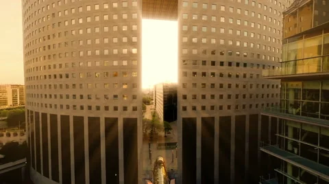 Sun beam shines trough building. sun rays. helicopter fly over. city Video stock 64535747