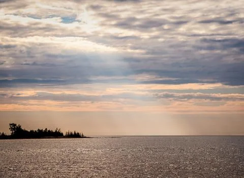 Sun Beam thru Clouds Morning over Lake Michigan Shoreline Stock Photos