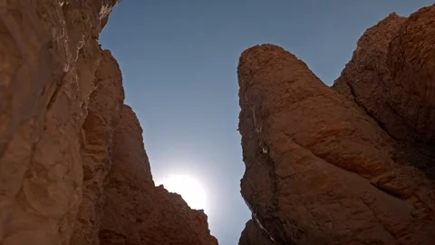Sun Beaming Behind Towering Limestone Cliffs of the Valley of the Kings 스톡 동영상 336954188
