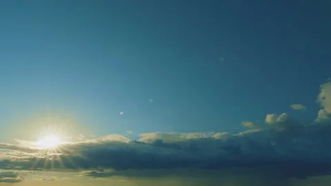 Sun Beams Or Rays With Clouds At Day. Dramatic Blue Sky With Sun Shining With Stock Footage 263002374