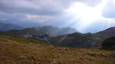 Sun Beams through clouds German Alps Alpine panorama bad Hindelang hike Stock Photos