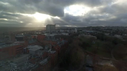 Sun beams through dark clouds Sheffied England UK Stock Footage 171593214