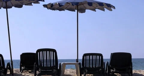 Sun beds background calm sea Stock Footage 105817115