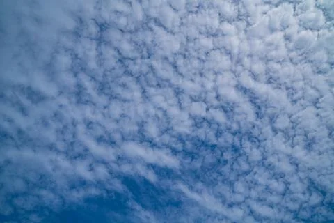 Sun Behind Altocumulus Clouds Stock Photos