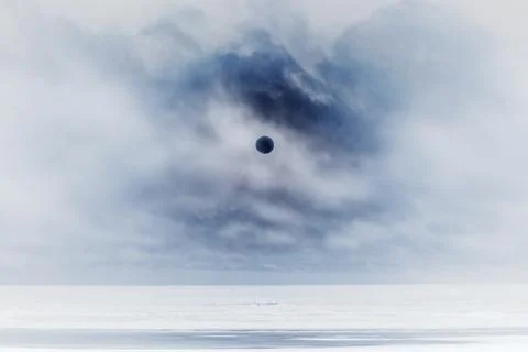 Sun behind clear clouds and fog, vast ocean and beach below, Long Beach Pen.. Stock Photos