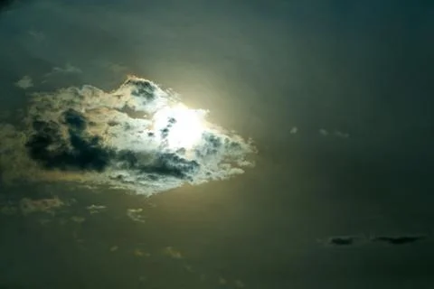 Sun behind cloud Stock Photos