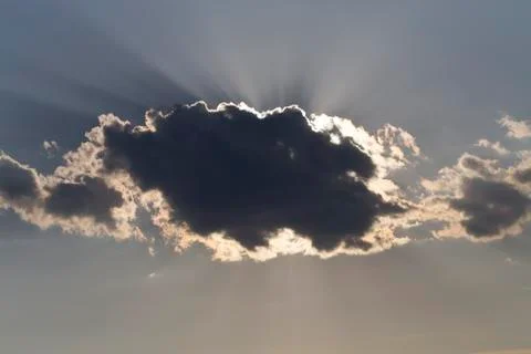 The sun behind the cloud. 스톡 사진