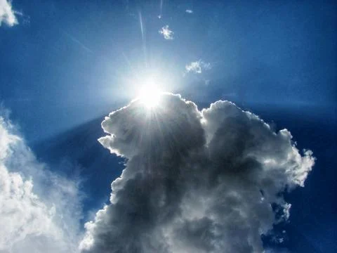 Sun Behind a Cloud Stock Photos