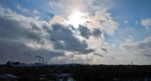 Sun behind the clouds Stock Photos