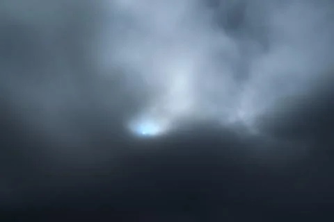 Sun behind the clouds Stock Photos