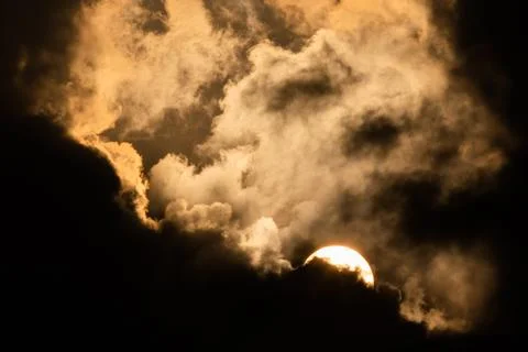 Sun behind the clouds Foto stock
