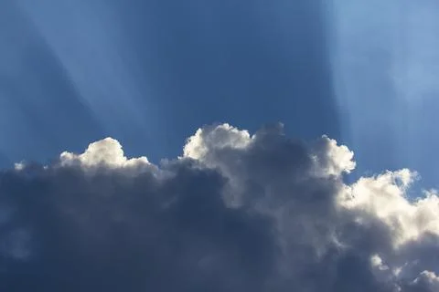 The sun behind the clouds. Stock Photos