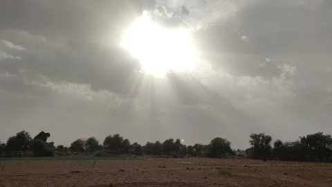 Sun behind the clouds, sunlight behind the clouds Stock Photos