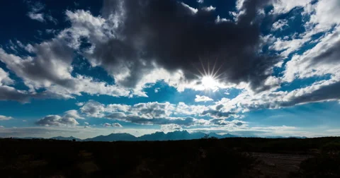 Sun Behind the Clouds Time Lapse Stock Footage 57755259