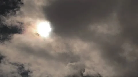 Sun behind clouds timelapse Stock Footage 45645671