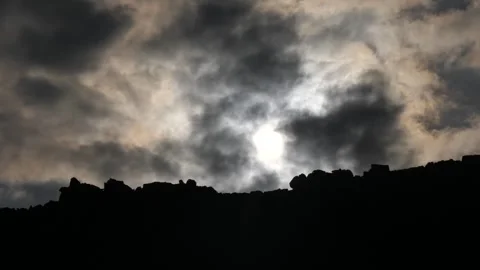 Sun behind the clouds in Ural mountains Stock Footage 281638924