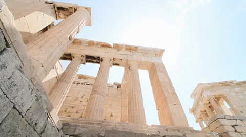 Sun behind columns in Athens acropolis citadel dolly camera Видео 62694246