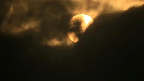 The sun behind darkness clouds Stock Footage 150273483