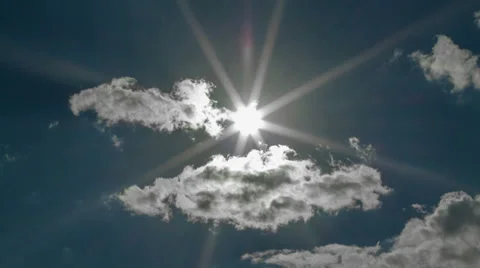 Sun behind the floating clouds Stock Footage 39833221