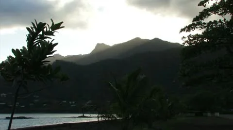 Sun Behind Island Mountains Видео 10713235