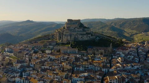 Sun behind mountain of Morella Stock Footage 110368402