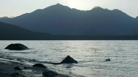 Sun behind the mountains at sunset 動画素材 260369975