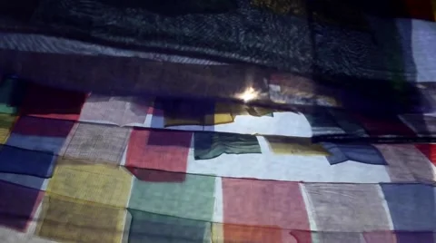 Sun behind prayer flags Stock Footage 65775656