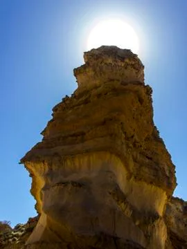 The sun behind sandstone mountain Foto stock