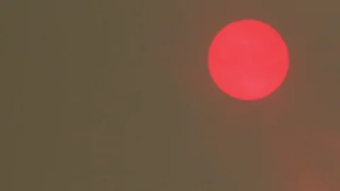 Sun behind smoke Stock Footage 78553775