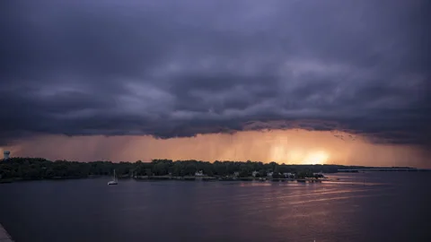 Sun Behind The Storm Timelapse Video stock 135253448