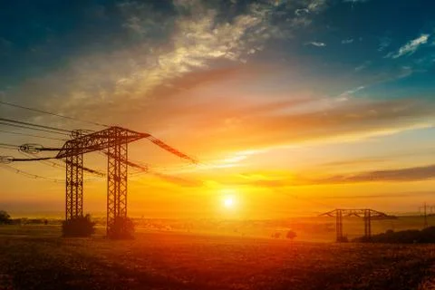 Sun behind wires Stock Photos