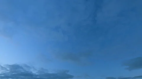 Sun below the horizon and clouds in the fiery dramatic sky. Clouds illuminated Stock Footage 219635320