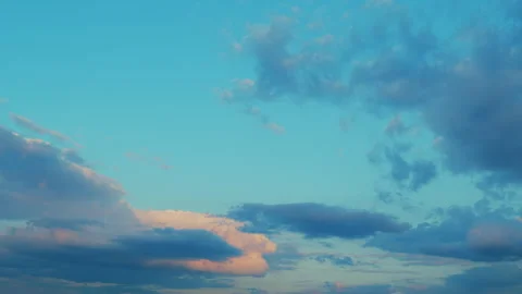 Sun below the horizon and clouds in the fiery dramatic sky. Clouds illuminated Stock Footage 264963971