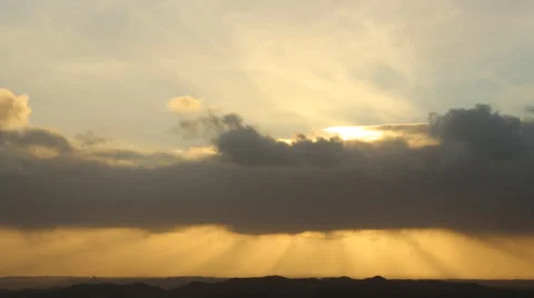 Sun beneath clouds Stock Footage 33705861