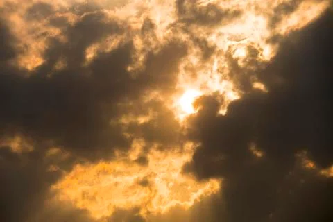 The Sun Beyond the Clouds - Orange Sky Foto stock