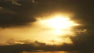 Sun Blasting Radiant Behind Timelapse Clouds Stock Footage