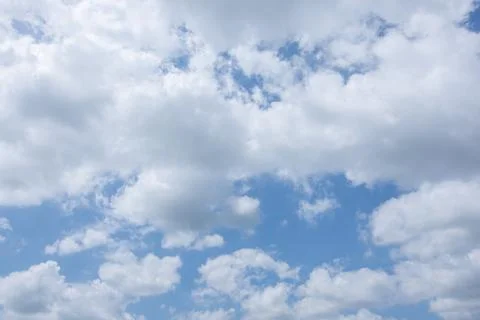 Sun, blue sky and clouds. Stock Photos