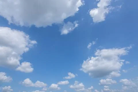 Sun, blue sky and clouds. Stock Photos